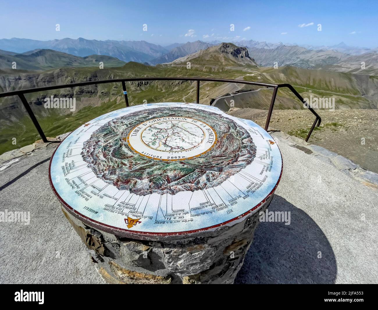 Orientation board at 2862 metre high viewpoint on Cime de la Bonette, in the background road over alpine pass Col de la Bonette, Cime de la Bonette Stock Photo