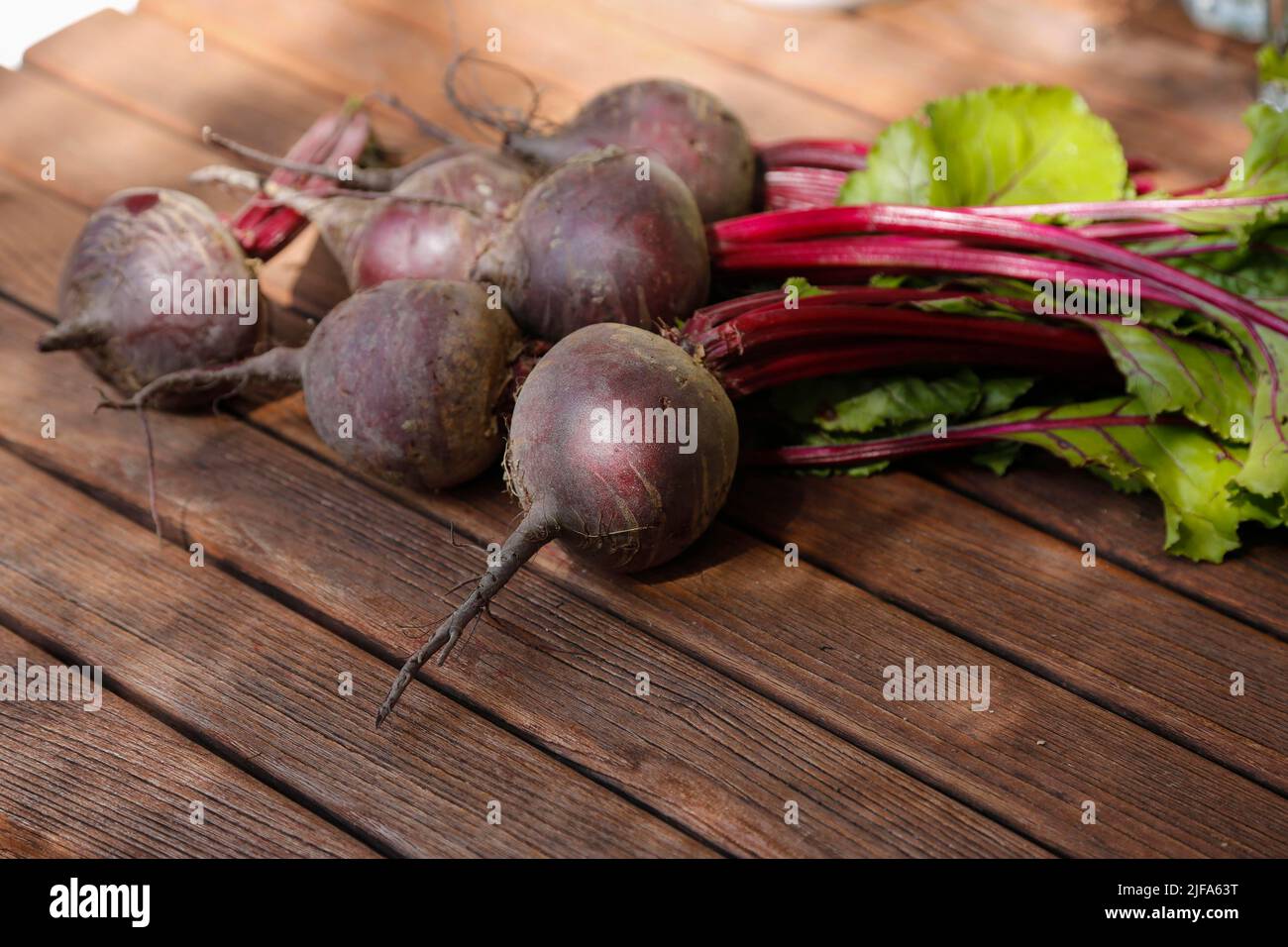 Southern German cuisine, preparation walnut cake with beetroot (Beta vulgaris), beetroot-carrot nut cake, raw beetroot, wooden board, vegetables Stock Photo