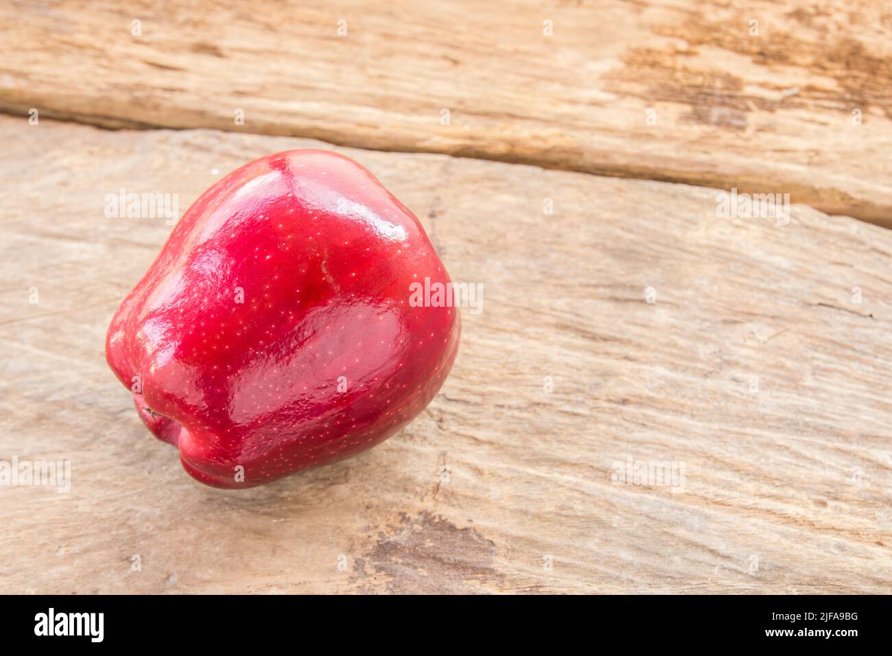 Fresh red apple on wooden table background Stock Photo