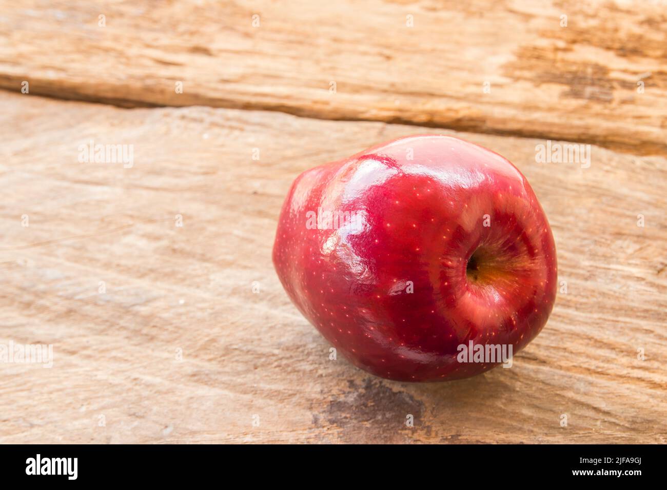 Fresh red apple on wooden table background Stock Photo