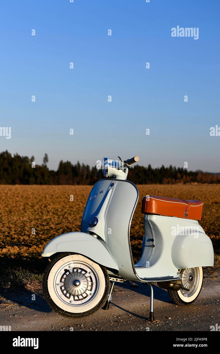 Vespa V 50, N, R, L, Spezial, Speciale, 50ccm, Moped, Scooter, Vespa, Piaggio, Moped, Oldtimer, Blue, Whitewall Tires, Country Road, Street, Nature Stock Photo