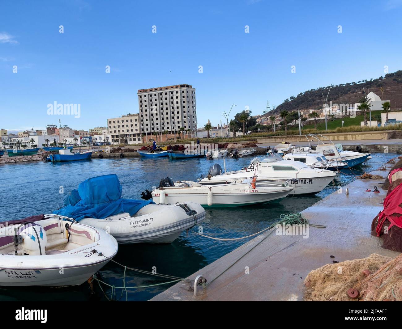 Fishing boats parked in the harbor Stock Photo - Alamy
