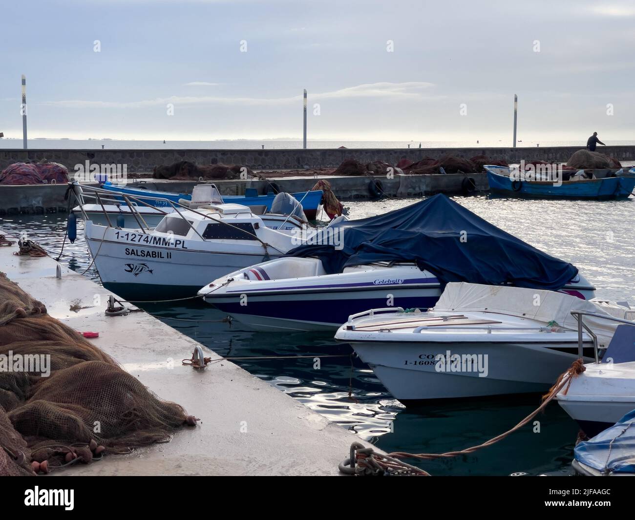 Fishing boats parked in the harbor Stock Photo - Alamy