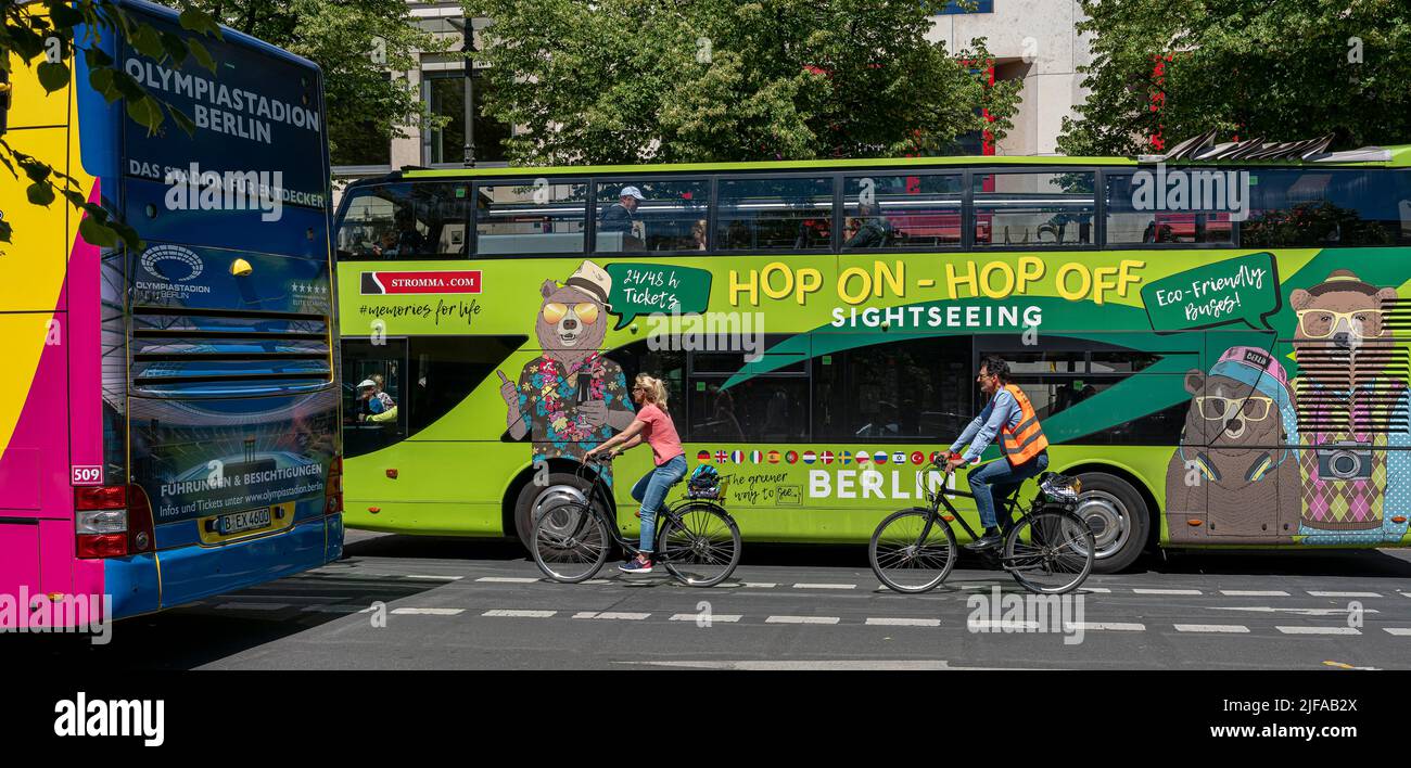 Cyclists and buses in Berlin road traffic, Berlin, Germany Stock Photo ...