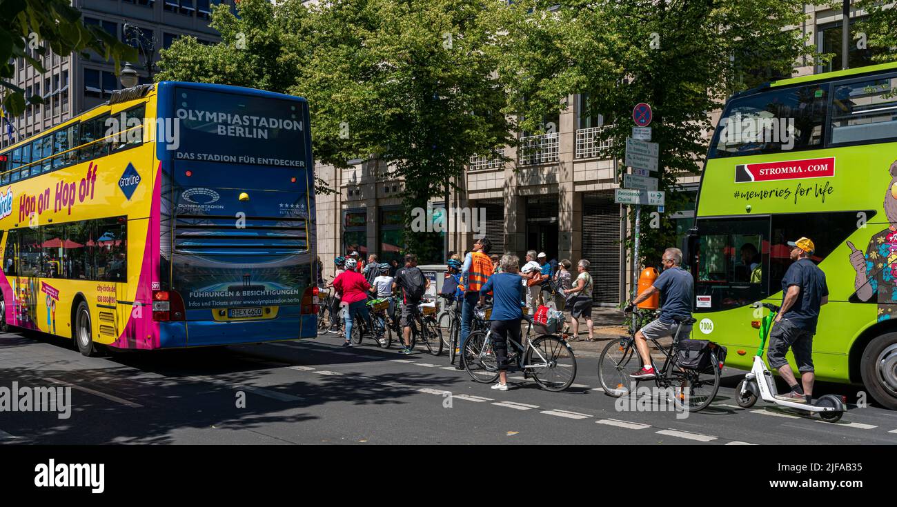 Cyclists and buses in Berlin road traffic, Berlin, Germany Stock Photo ...