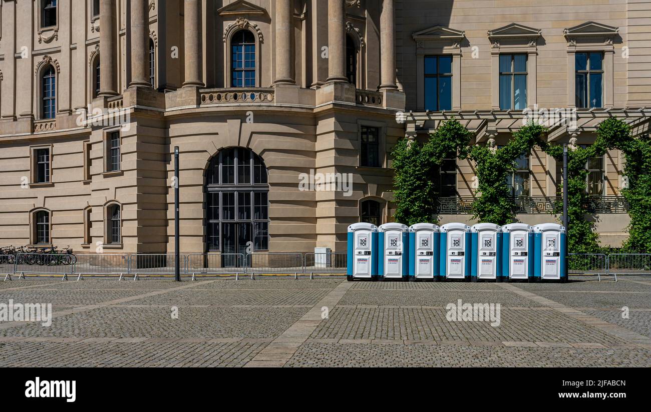 Mobile TOI TOI toilet cubicles, Bebel-Platz, Unter den Linden, Berlin, Germany Stock Photo