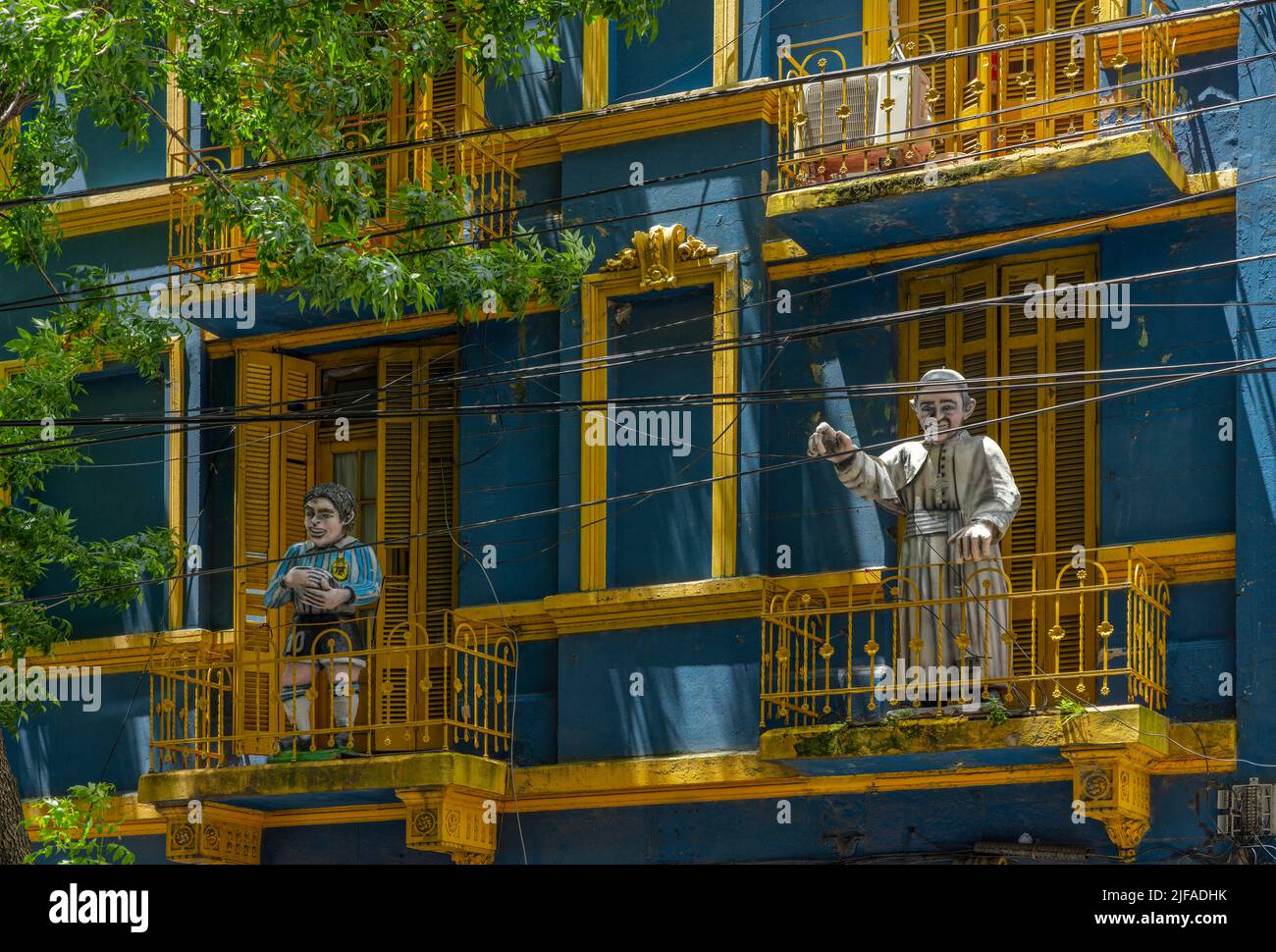 Balcony with figures of the Pope and Maradonna, Boca, Buenos Aires Argentina Stock Photo