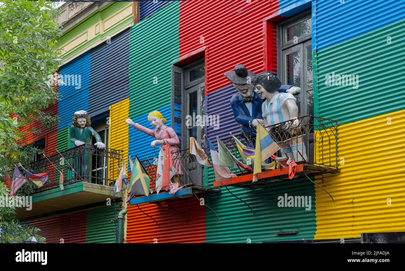 Figures on balconies, buildings, La Boca, Buenos Aires, Argentina Stock Photo