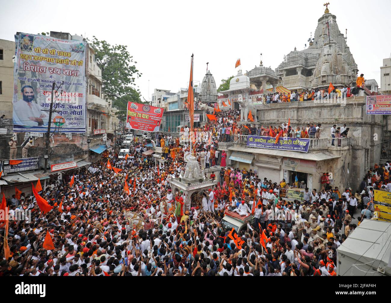 Hindu devotees gather to pull the 'Rath', or the chariot of Lord Jagannath, during the annual Rath Yatra, or chariot procession, in Udaipur in the northwestern state of Rajasthan, India, July 1, 2022. REUTERS/Amit Dave Stock Photo