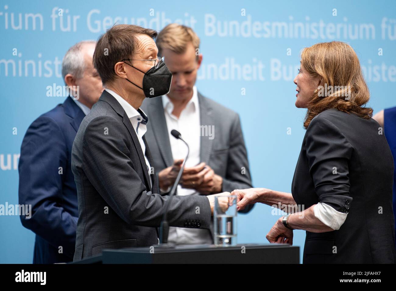 Berlin, Germany. 01st July, 2022. Helga Rübsamen-Schaeff, virologist, chemist and vice-chair of the Expert Committee for the Evaluation of the Infection Protection Act (IfSG), and Karl Lauterbach (SPD), Federal Minister of Health, take part in a press conference on the evaluation report of the IfSG. Today, the IfSG presents the results of the evaluation report of the Corona protection measures to date. Credit: Fabian Sommer/dpa/Alamy Live News Stock Photo