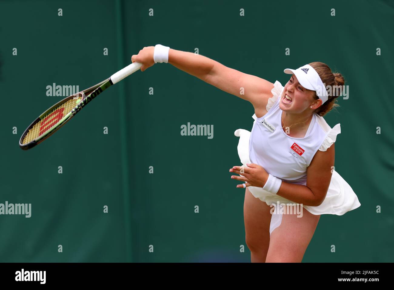 1st July 2022, All England Lawn Tennis and Croquet Club, London, England; Wimbledon Tennis tournament; Jelena Ostapenko serves to Irina-Camelia Begu in the womens singles Stock Photo