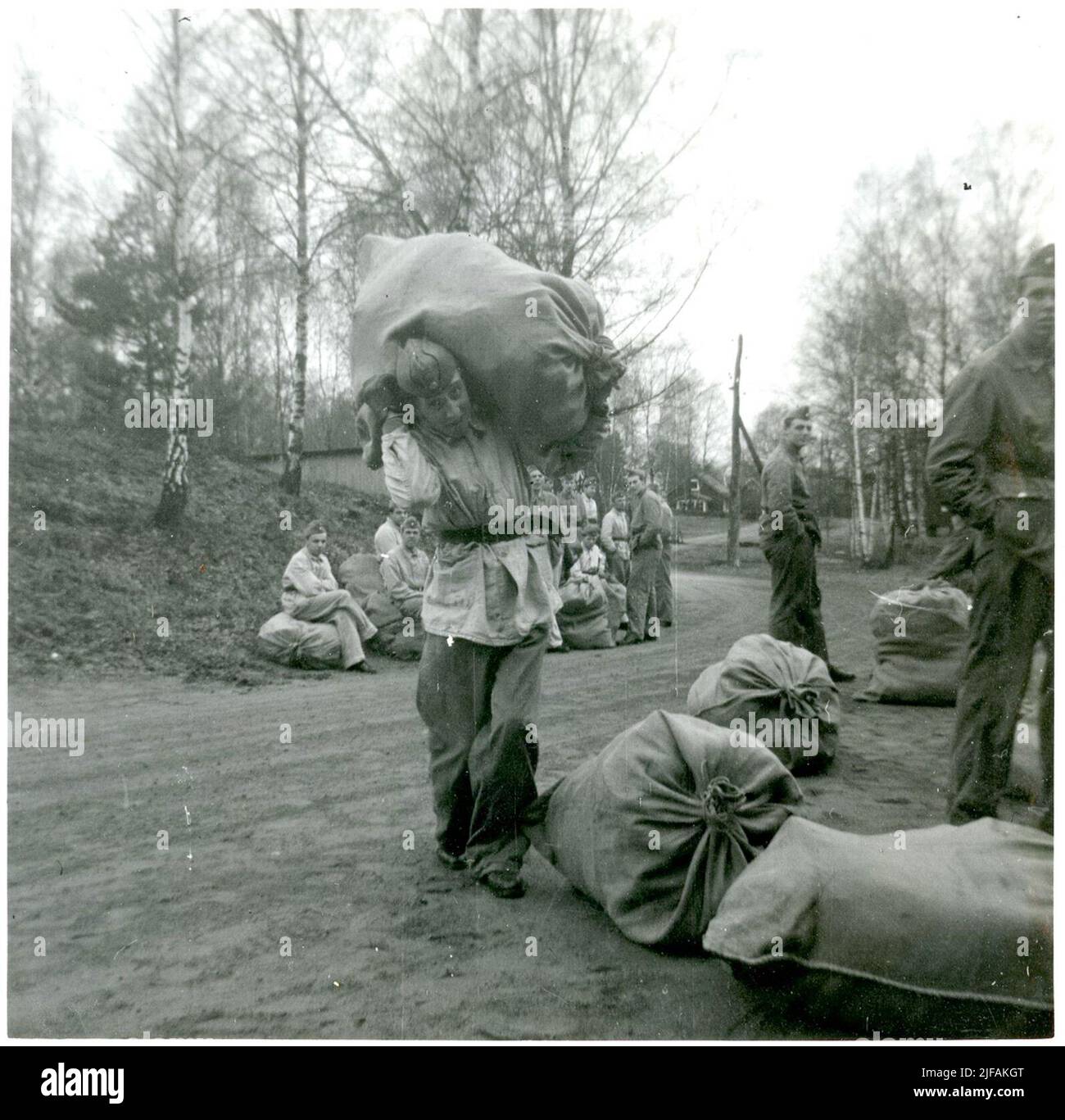 Conscripts carry a bag at Skåne Trängregementet T4, Hässleholm. Stock Photo