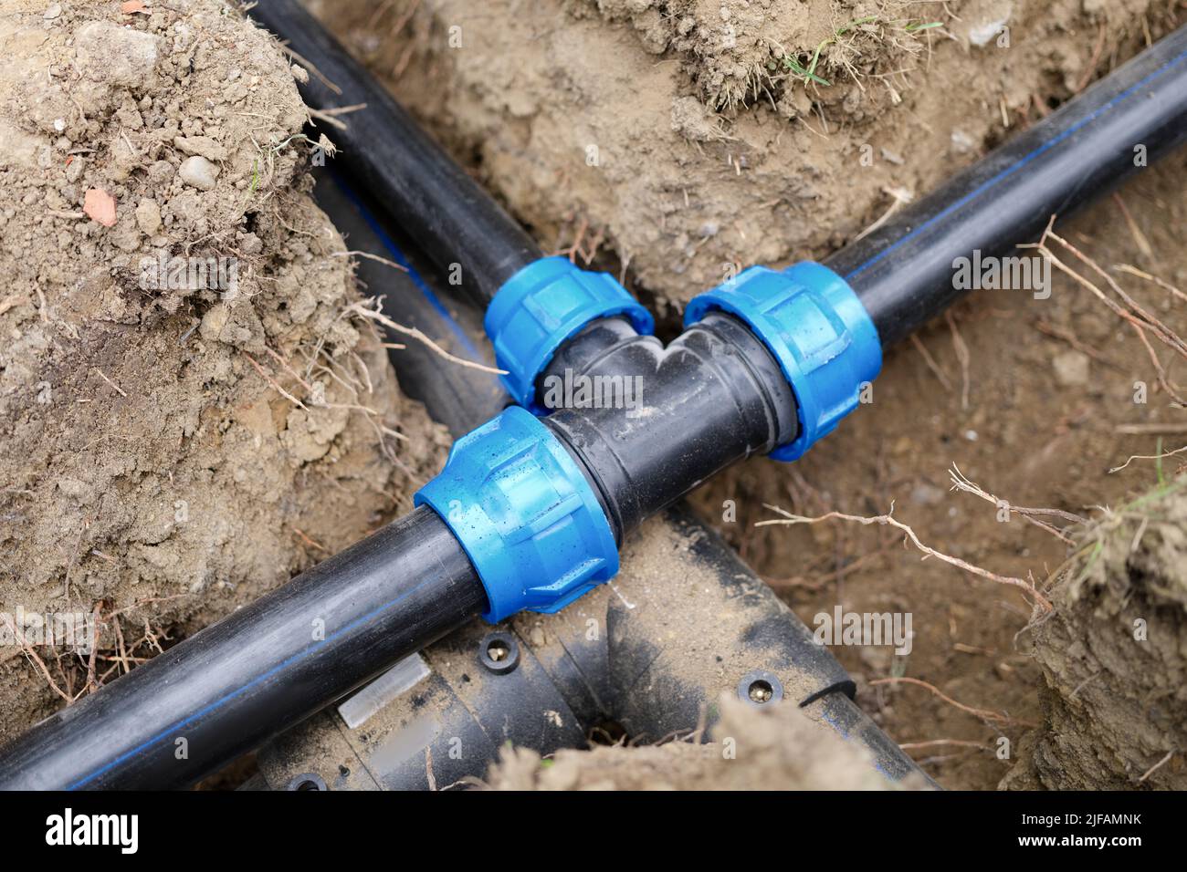 Black Plastic Pipes For Irrigation In Country Stock Photo - Alamy