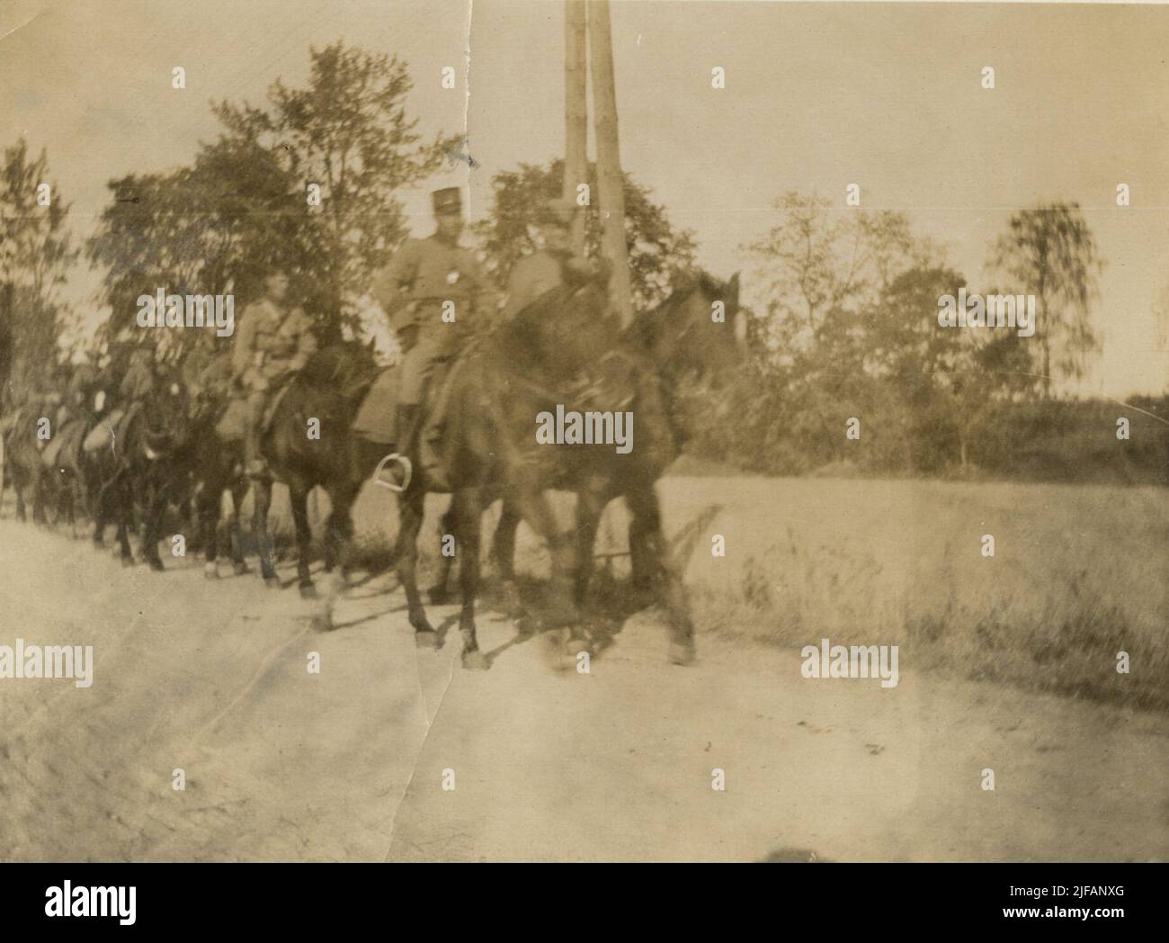 A group of soldiers on horse riding along the way Stock Photo - Alamy