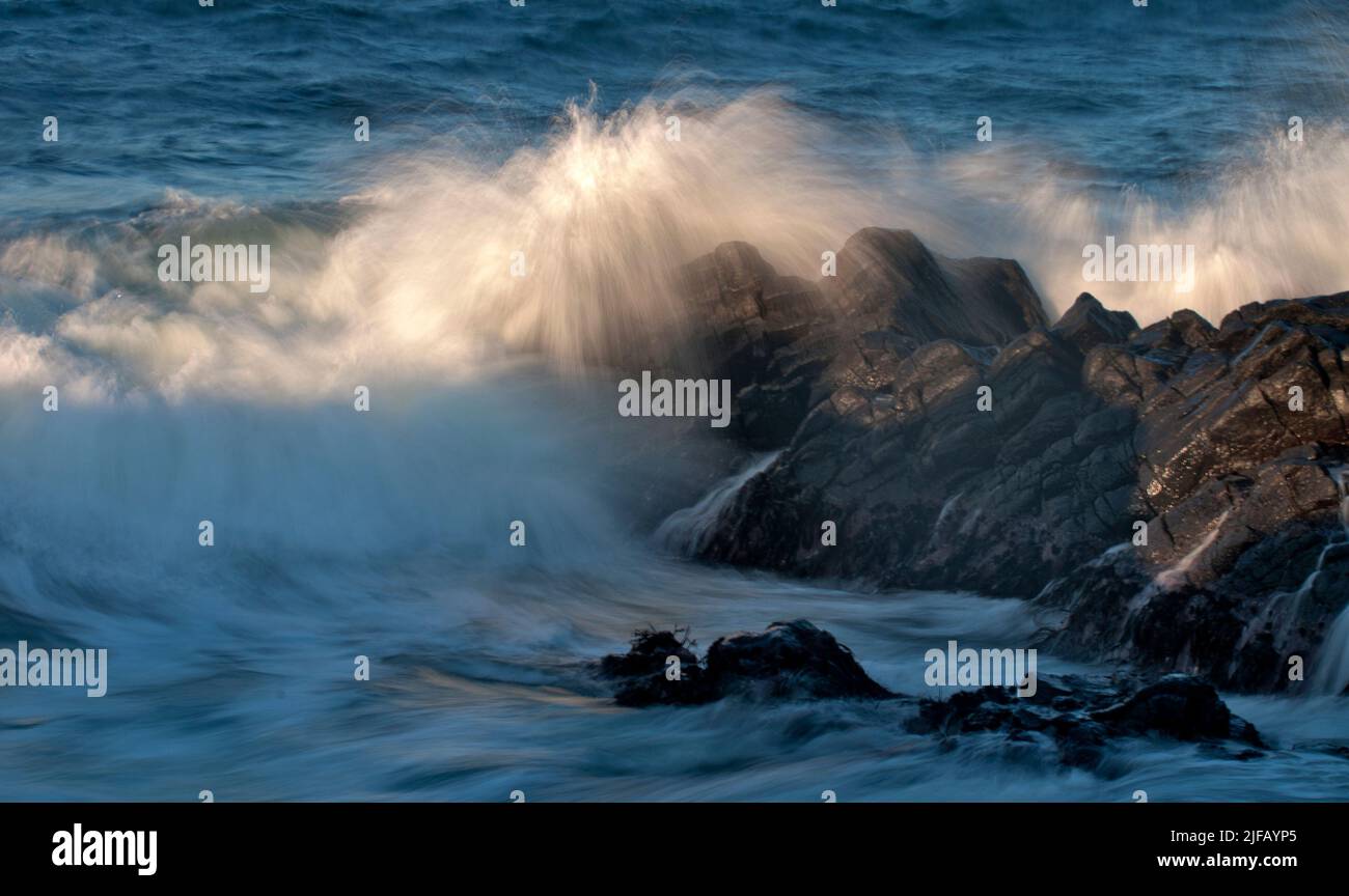Waves break at the shore of Lista, south-western Norway. Stock Photo