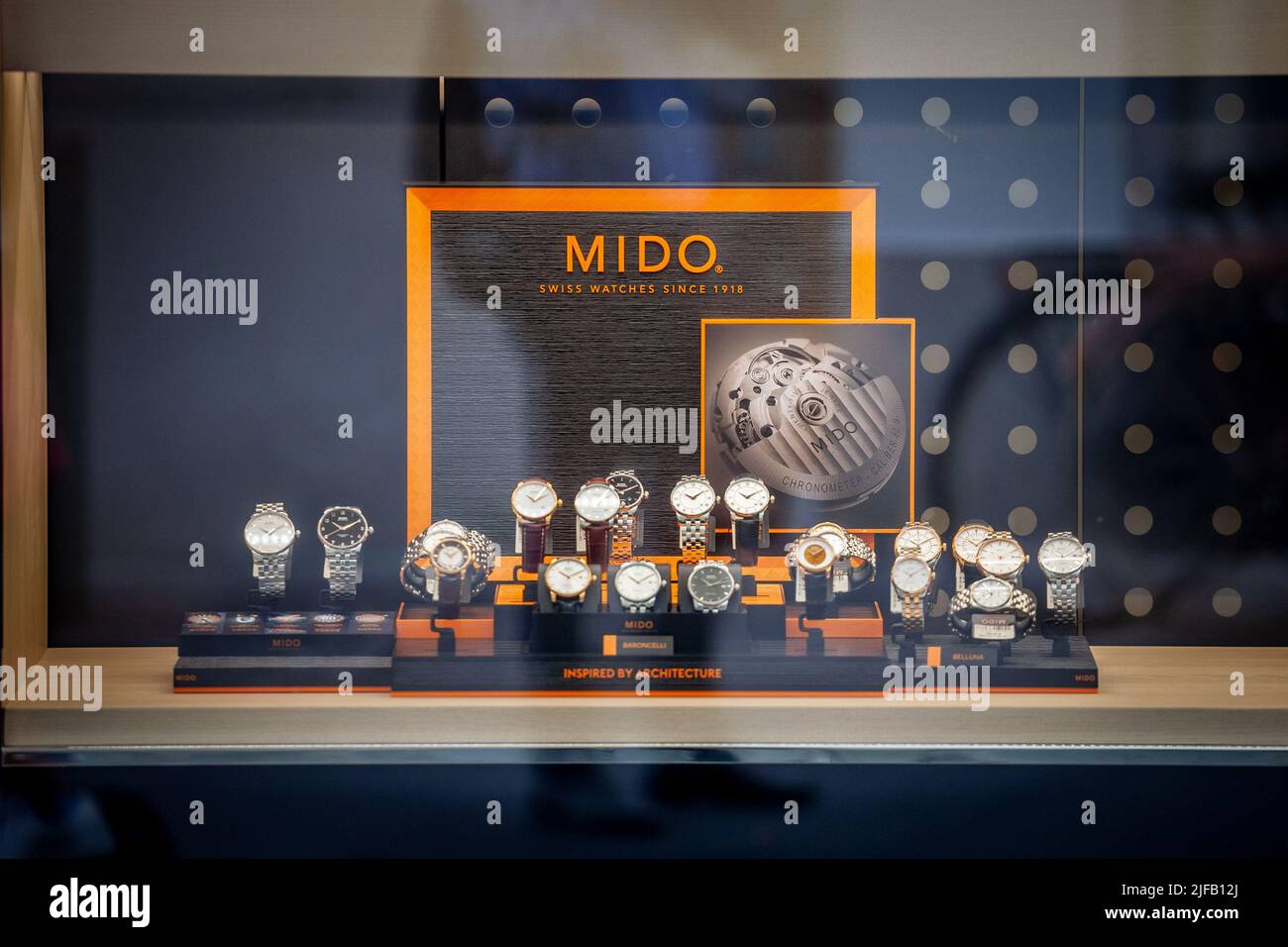 Picture of a sign with the logo of Mido taken on their local retailer in  the city center of Ljubljana, Slovenia. Mido is a Swiss watchmaker. The  compa Stock Photo - Alamy