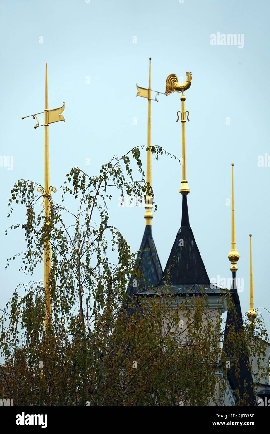 Kiev, Ukraine November 28, 2020: Architectural decoration of the building of the puppet theater with golden spiers with weather vane in the city of Ki Stock Photo