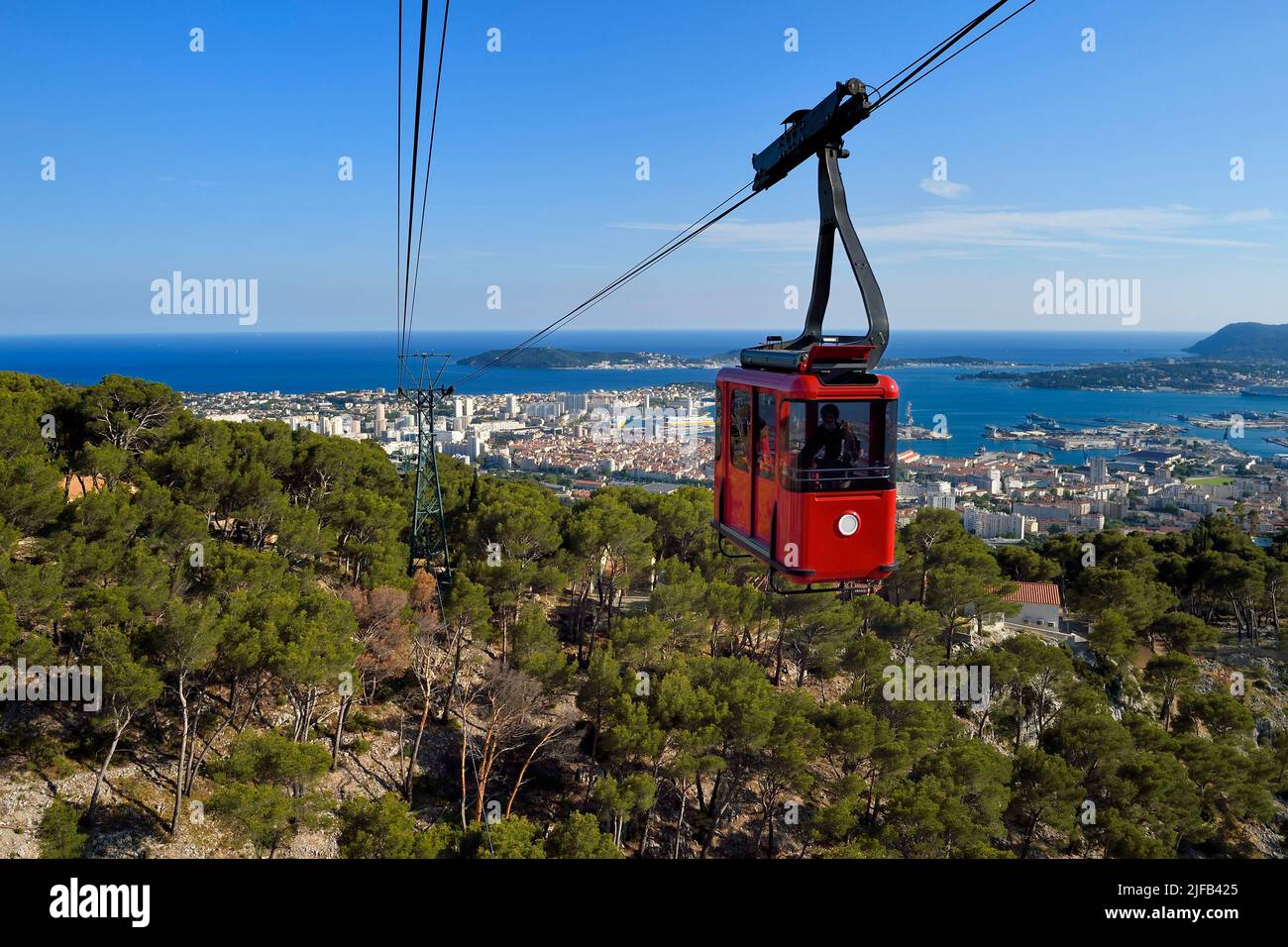 France, Var, Toulon, the cable car from the Mont Faron, the city and the naval base (Arsenal) in the Rade (Roadstead) in the background Stock Photo