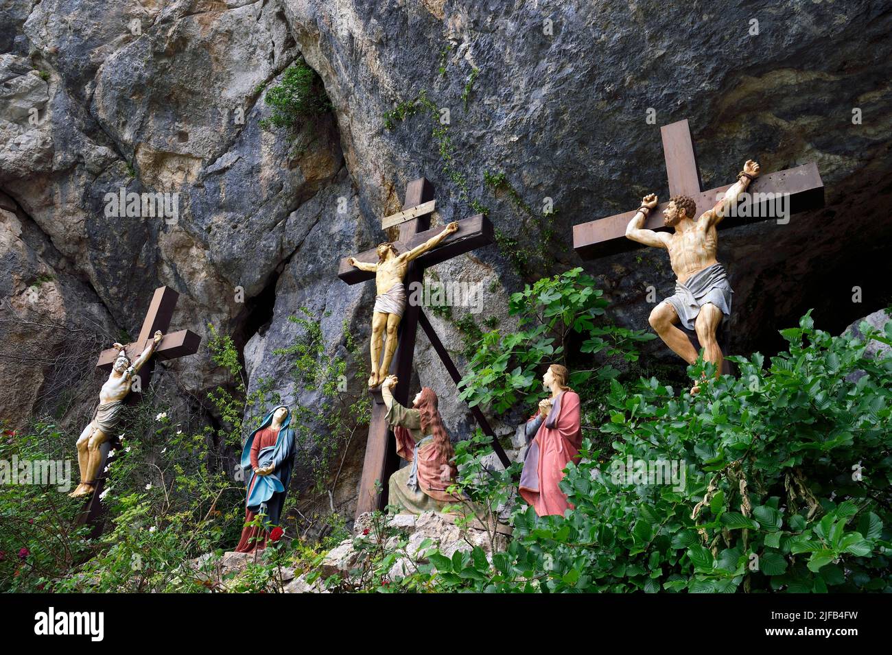 France, Var, Plan d'Aups Sainte Baume, Sainte-Baume Regional Nature Park, Sainte Baume massif, calvary in front of the cave sanctuary of Sainte Marie-Madeleine (St. Mary Magdalene), Jesus Christ surrounded by the good and the bad thief, the Virgin Mary, Saint John and Mary Magdalene at his feet Stock Photo