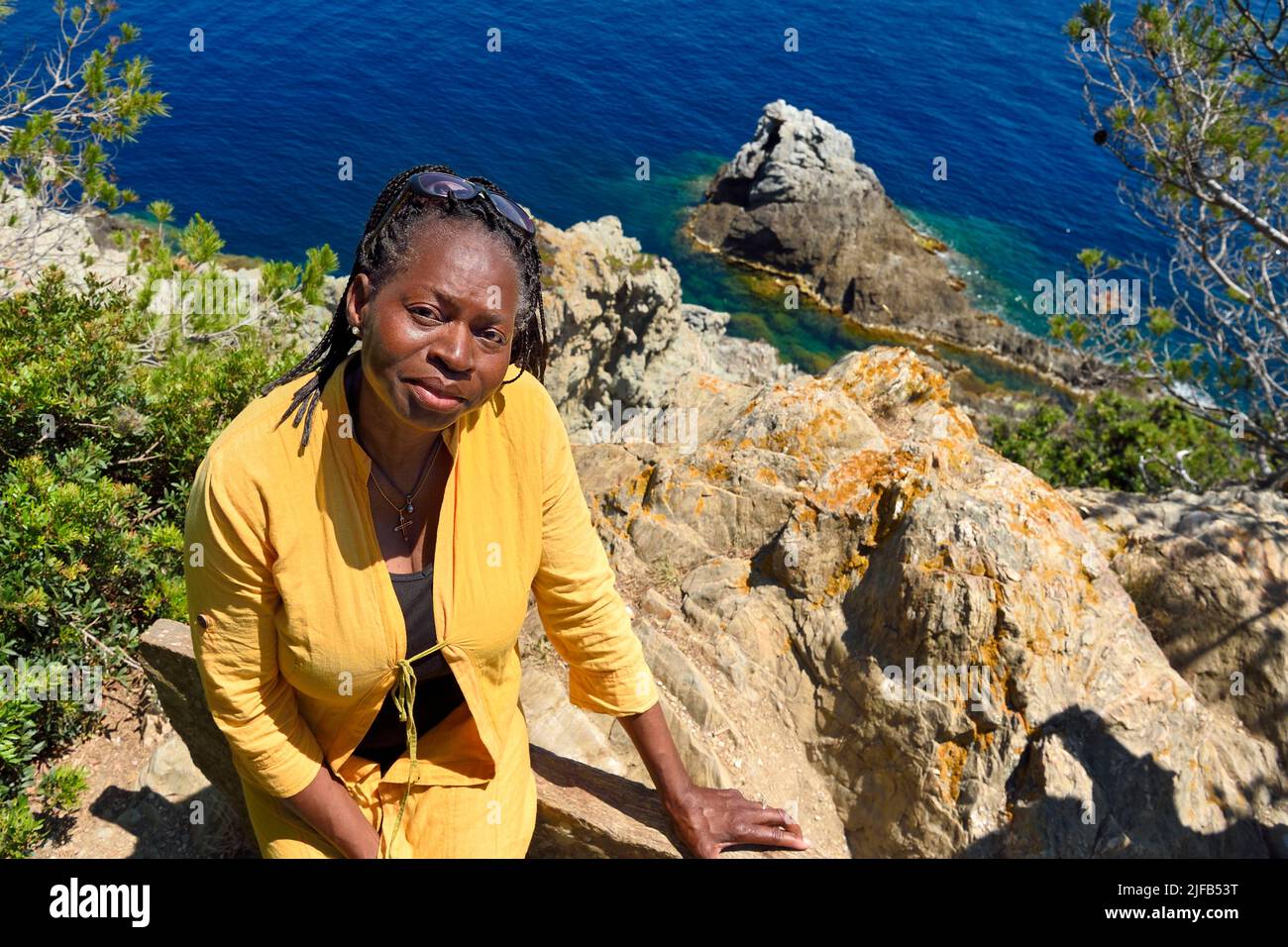 France, Var, Iles d'Hyeres, Parc National de Port Cros (National park of Port Cros), Porquerolles island, cap d'Arme, the writer and journalist Marie-Joséphine de Clercq who lives and works in the Island Stock Photo