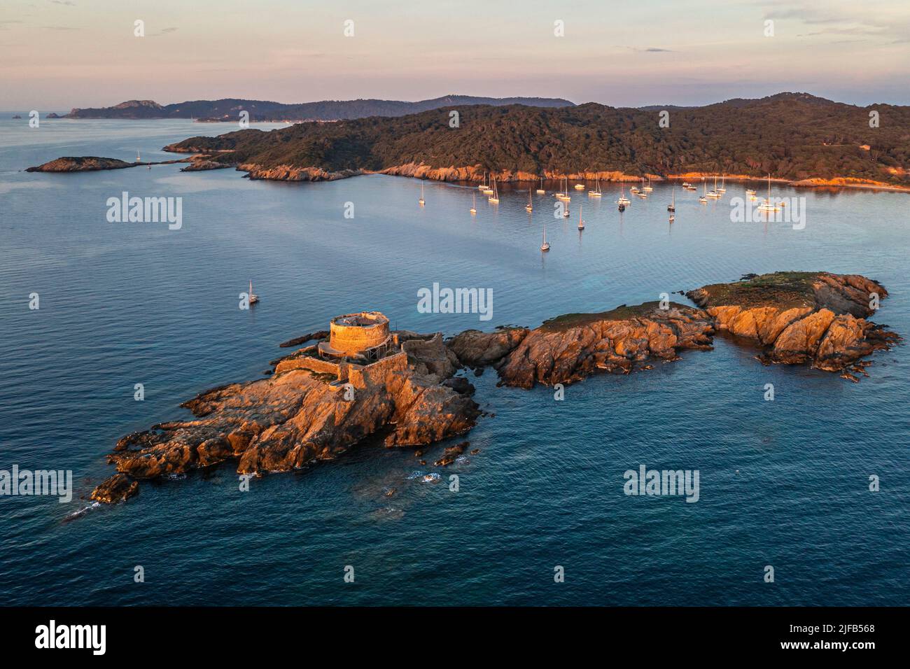 France, Var, Iles d'Hyeres, Parc National de Port Cros (National park of Port Cros), Porquerolles island, the 17th century Fort du Petit Langoustier on its island and Porquerolles in the background (aerial view) Stock Photo