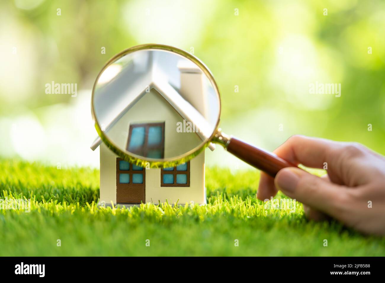 Real Estate House Inspector Checking Property Using Magnifying Glass Stock Photo Alamy