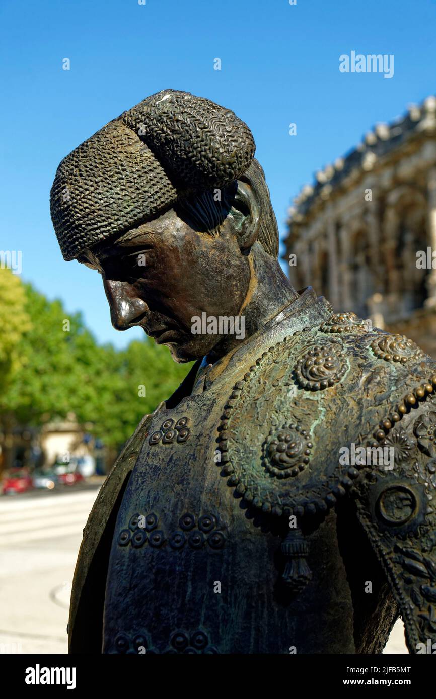 France, Gard, Nimes, Place des arenes, Nimeno II torero statue by Serena Carone in 1994 in front of the Arenas Stock Photo