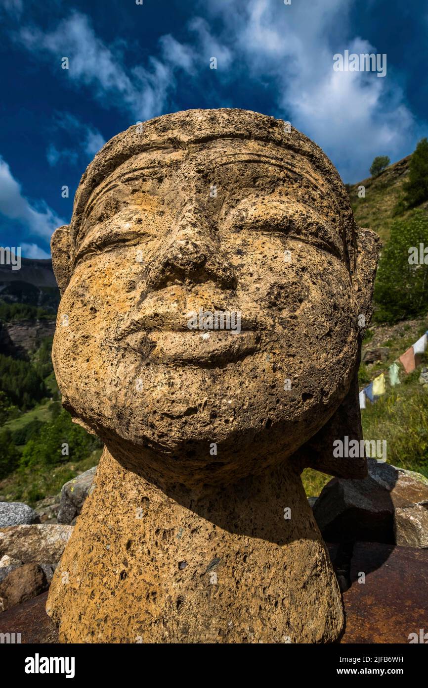 France, Hautes-Alpes, Champsaur, valley of Champoléon, village of the Borels, val of Tourond, Tourond mountain hut, nepalese chörten and Buddha's head Stock Photo