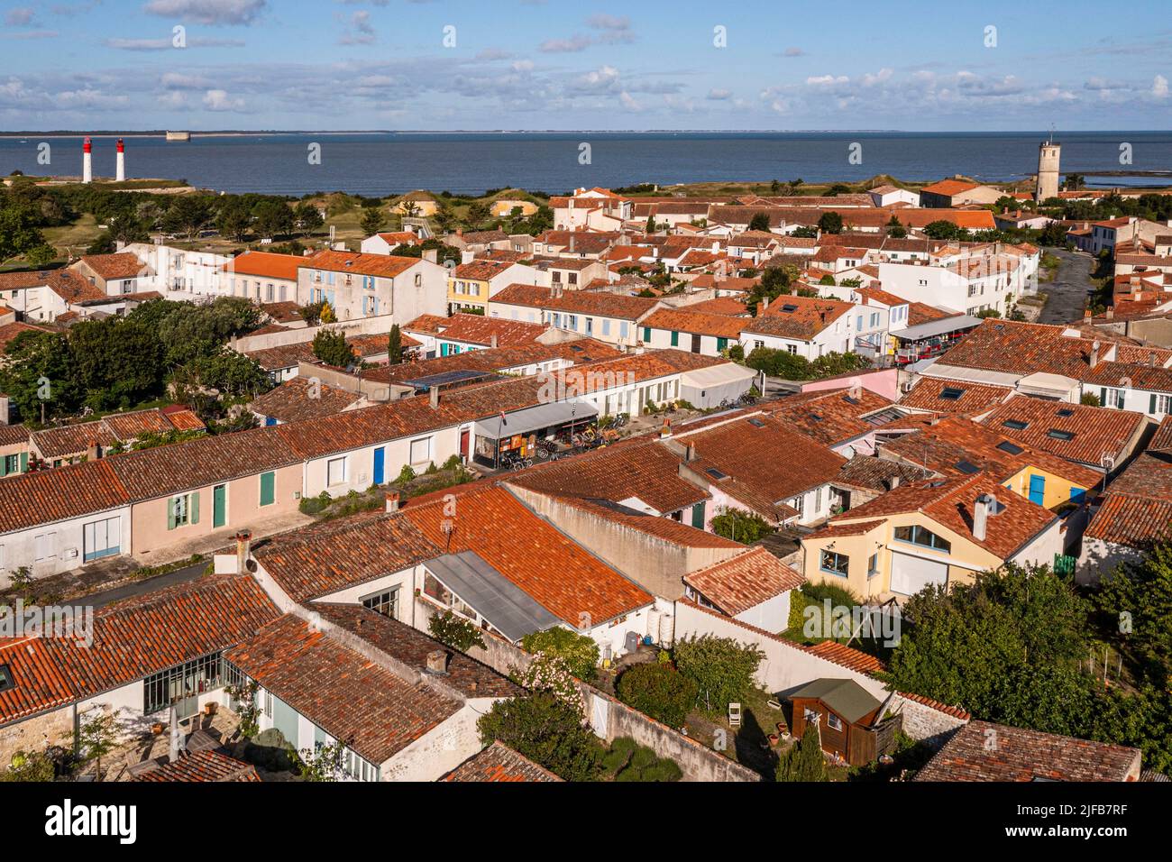 France, Charente-Maritime, Ile d'Aix (Aix Island), the village, old fishermen's houses in Marengo street, Fort Boyard in the background (aerial view) Stock Photo