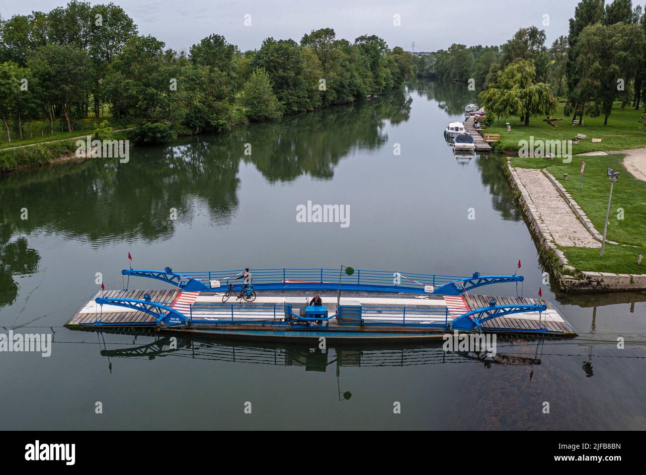 France, Charente-Maritime, Chaniers, ferry allowing passage on the Charente river and cyclist on the Flow Vélo cycle route(aerial view) Stock Photo