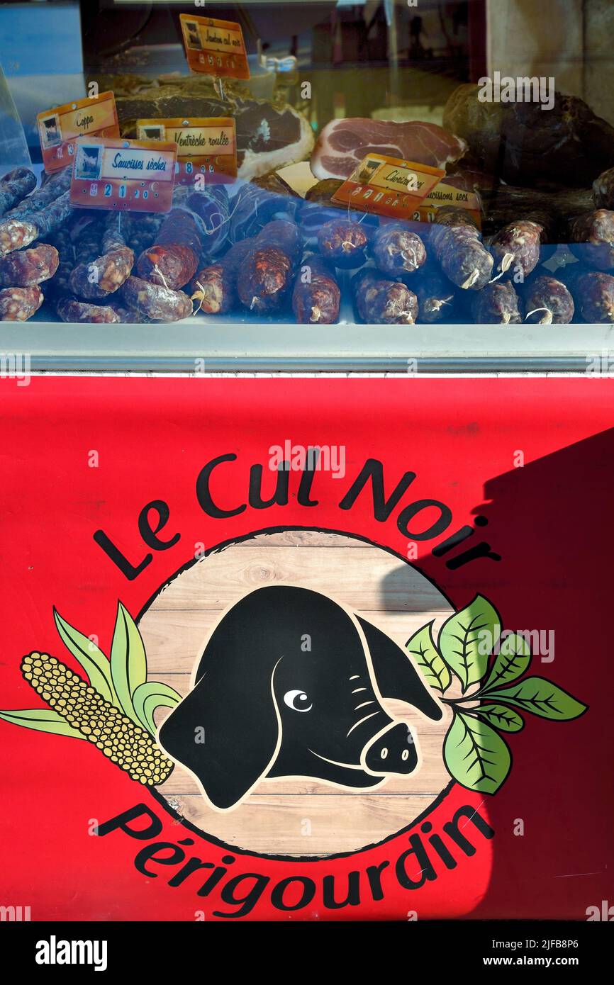 France, Dordogne, Périgord Vert, Thiviers, Saturday morning market on Place Foch, butcher's stall Stock Photo