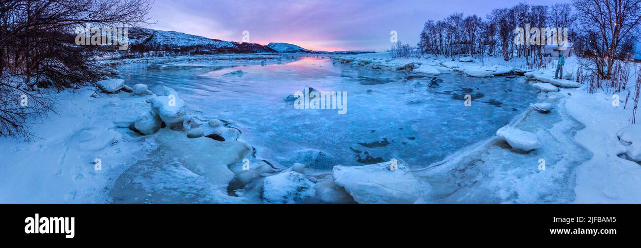 Norway, Lapland, County of Finnmark, Ropelv, fjord leading to the ice-covered Barents Sea, at sunset during the polar night (11:55), panoramic view Stock Photo
