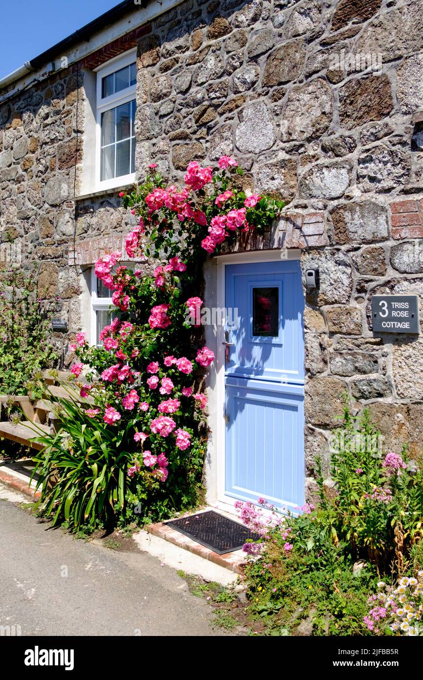 Stone Cottages in the Cornish Village of Lizard. the Lizard Peninsula Cornwall UK Roses around the door Stock Photo