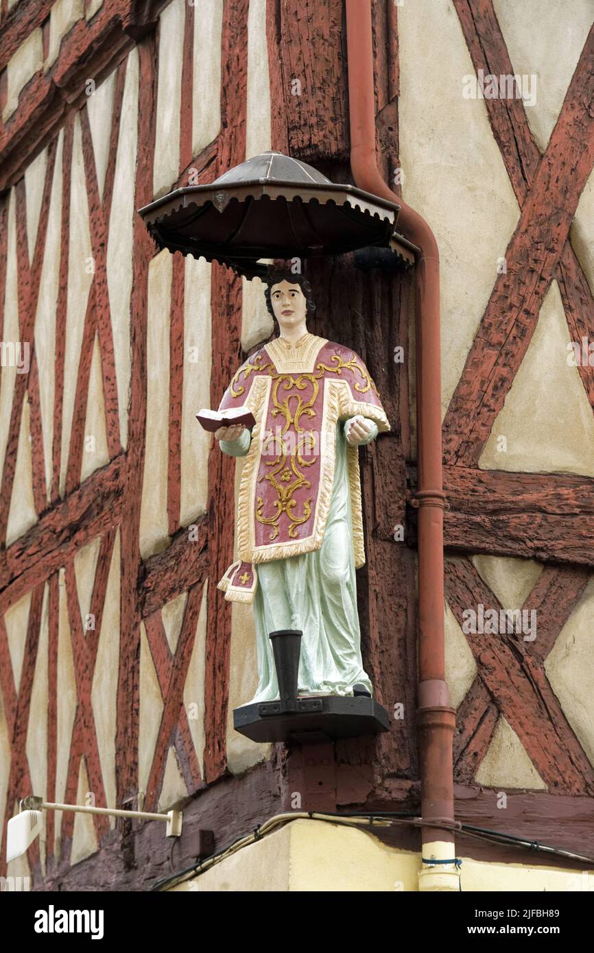 France, Saone et Loire, Chalon sur Saone, Saint Vincent Square, statue of Saint Vincent adorning a half timbered house Stock Photo
