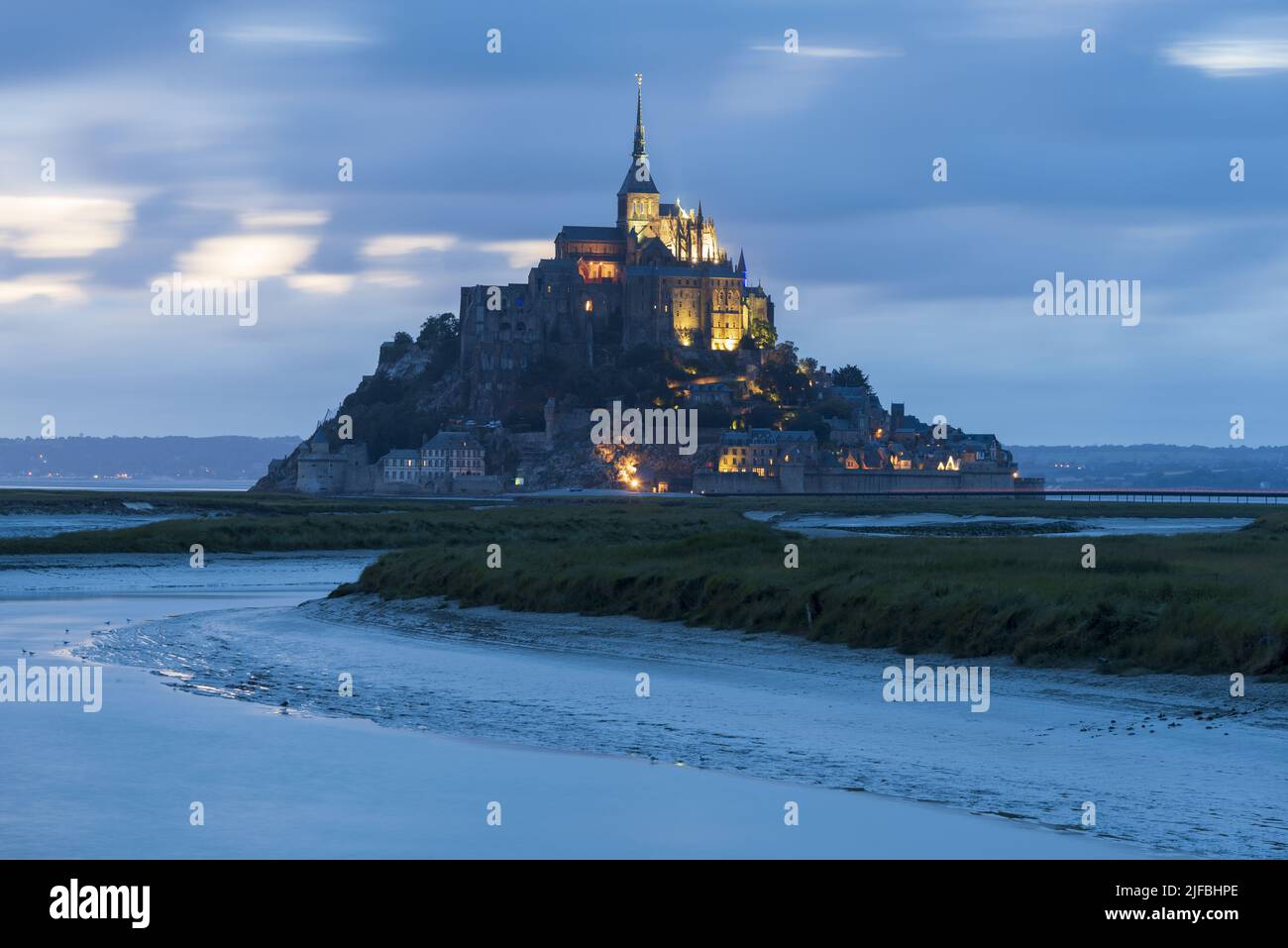 France, Manche, Mont Saint Michel Bay listed as World Heritage by UNESCO, Abbey of Mont Saint Michel and River Couesnon, at night Stock Photo