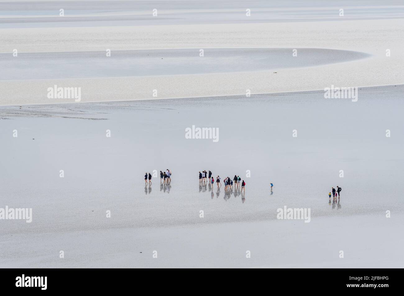 France, Manche, Bay of Mont Saint Michel listed as World Heritage by UNESCO, crossing the bay on foot Stock Photo