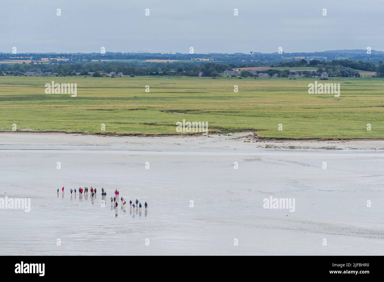 France, Manche, Bay of Mont Saint Michel listed as World Heritage by UNESCO, crossing the bay on foot Stock Photo