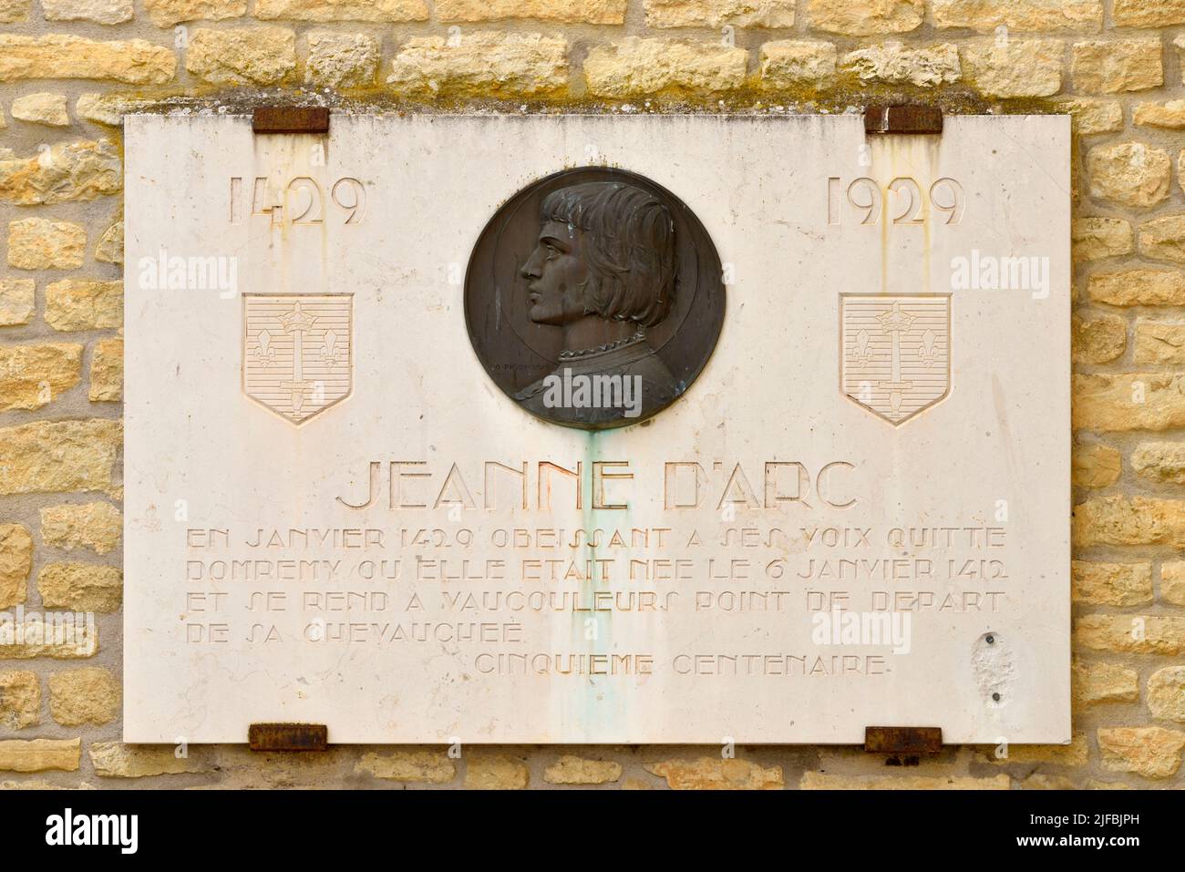 France, Vosges, Domremy la Pucelle, birthplace of Joan of Arc, plaque on the Saint-Rémy church Stock Photo