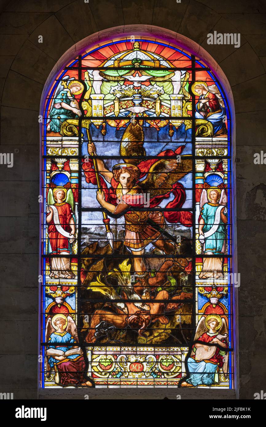 France, Rhone, Givors, Saint-Nicolas church, stained glass windows by the greatest master glassmakers of the 19th century, Saint Michael slaying the dragon Stock Photo