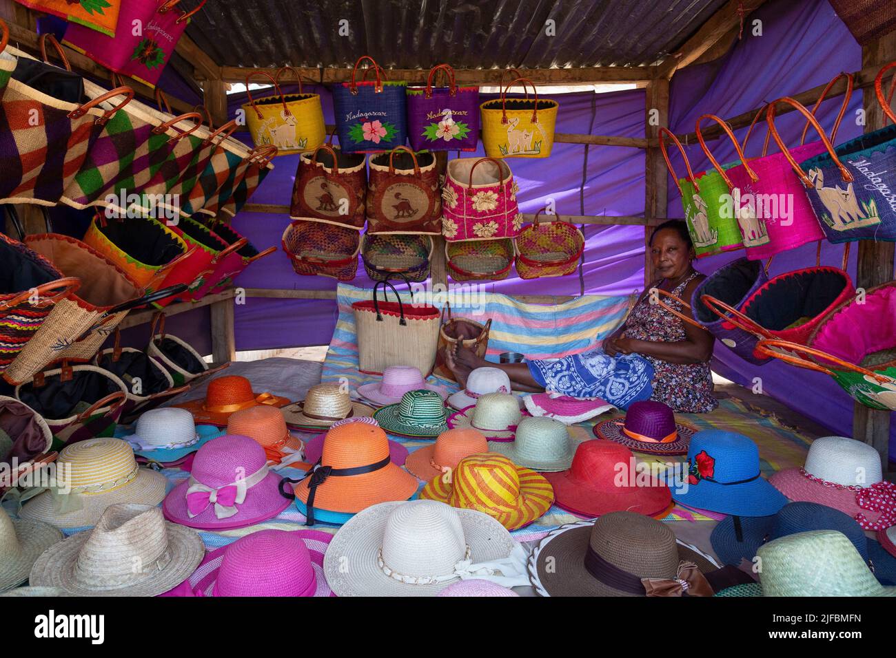 Madagascar, Menabe region, Bemaraha massif, Belo sur Tsiribihina, a woman selling hats on the market Stock Photo