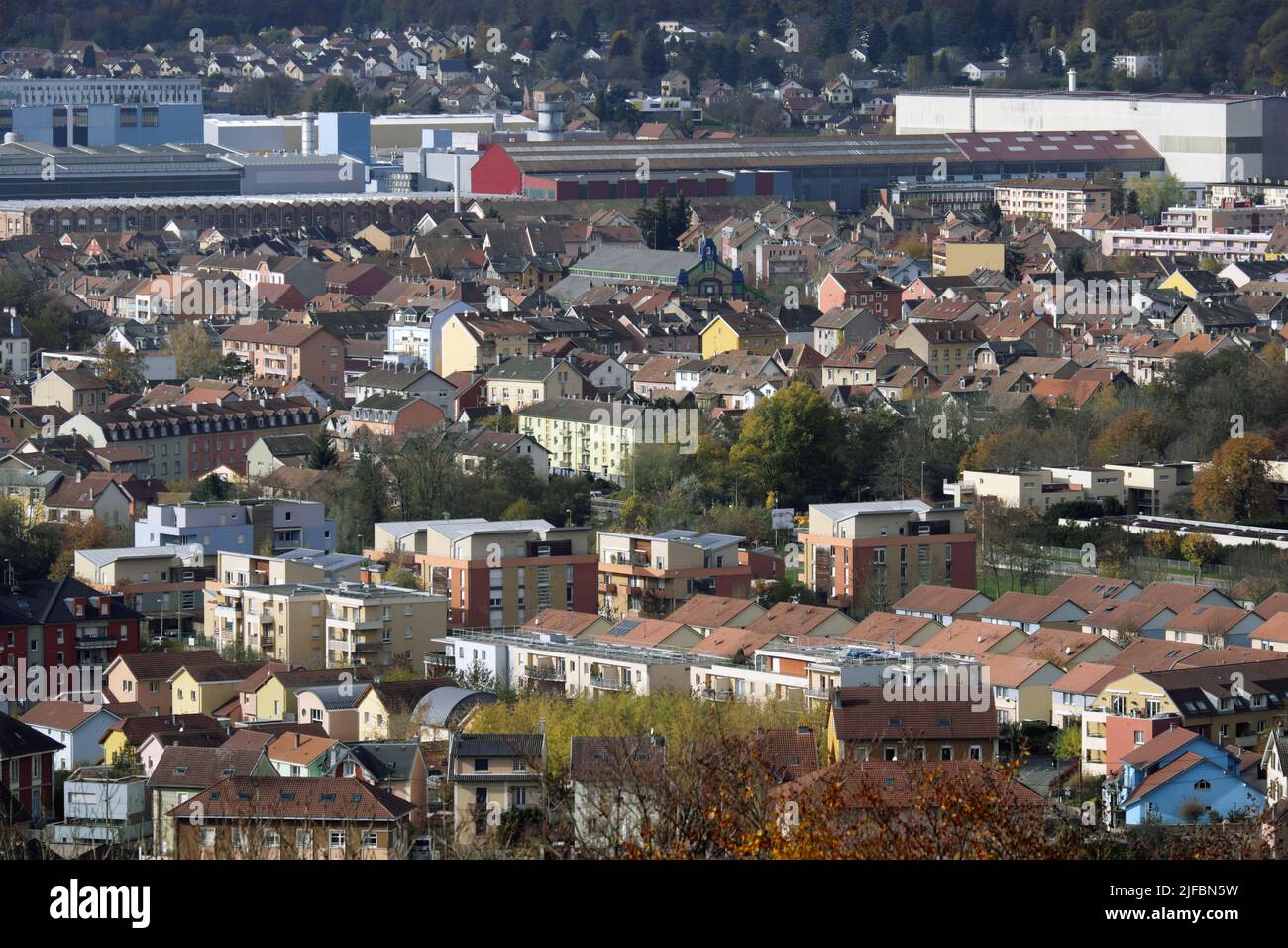 France, Territoire de Belfort, Belfort, the city from the Miotte tower, the Vosges district and the covered market, Alstom and General Electric factories, Cravanche under the Salbert hill Stock Photo