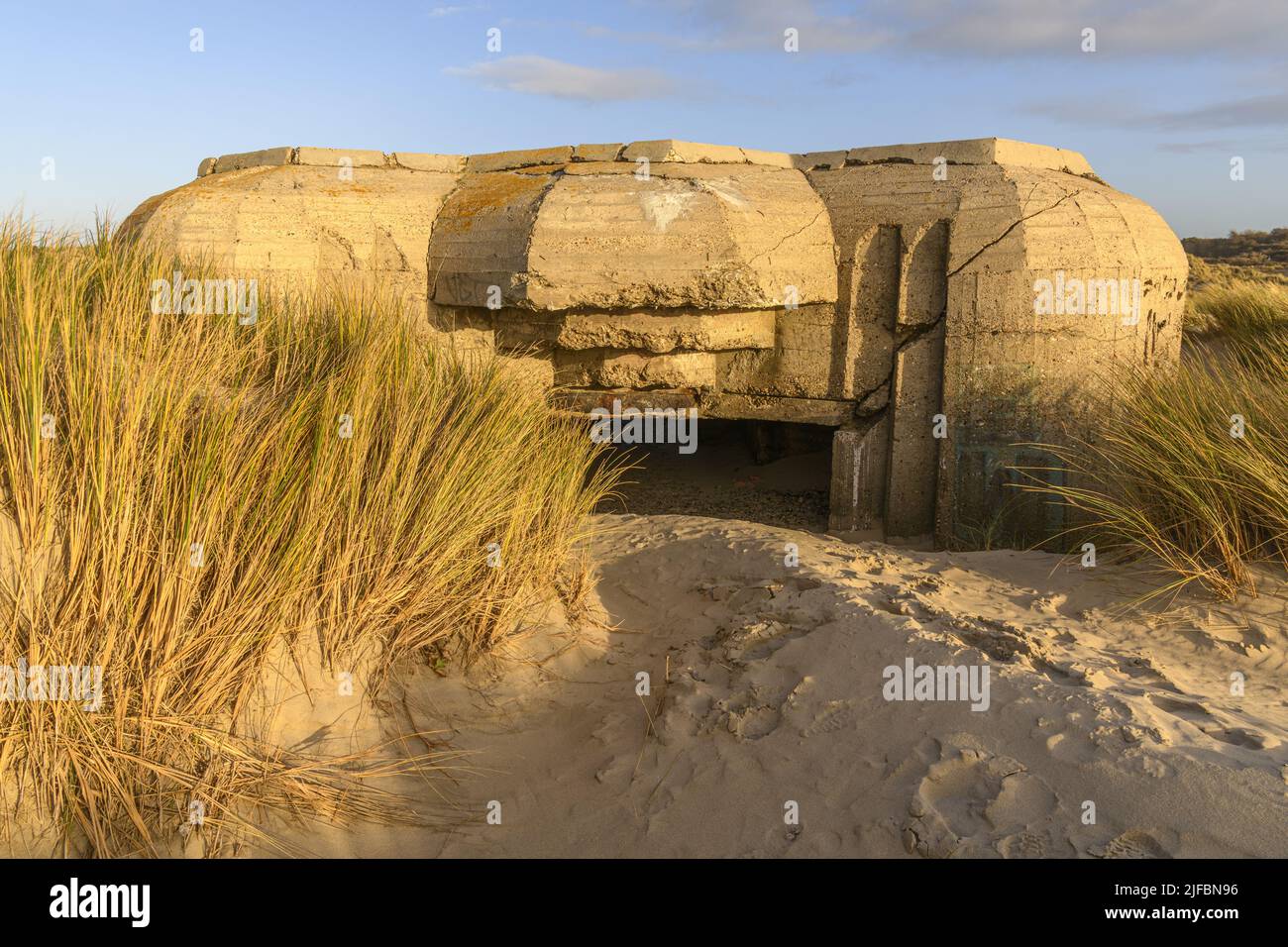 France, Somme, Baie de Somme, Saint-Valery-sur-Somme, The dunes of Marquenterre between Fort-Mahon and the Baie d'Authie at sunset, blockhouse, vestige of the Atlantic Wall Stock Photo
