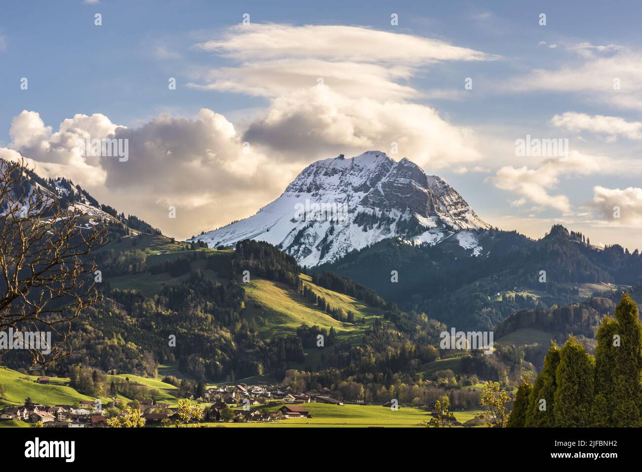 Switzerland, Canton of Fribourg, Gruyères, medieval city, Mount Moléson in the background Stock Photo