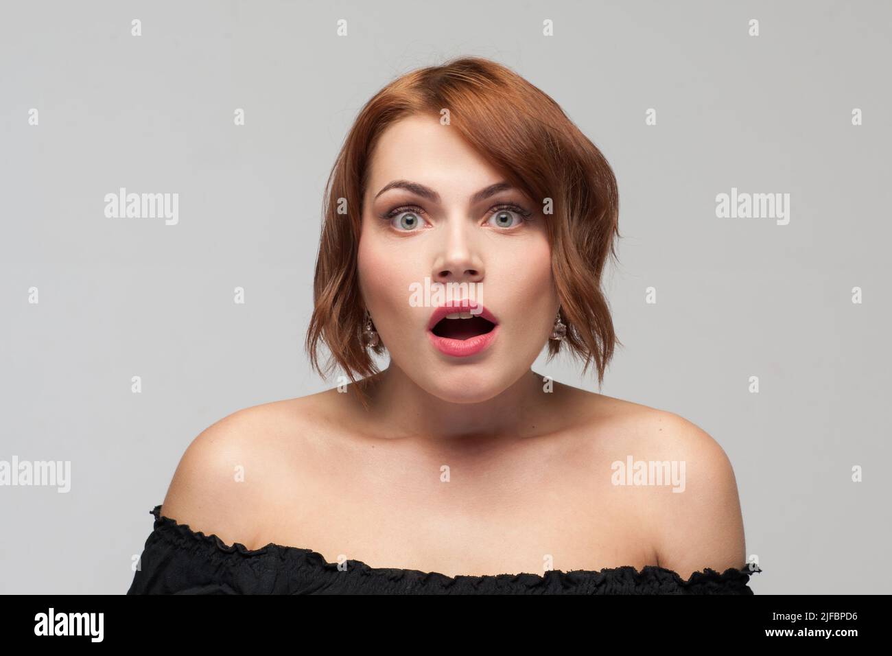 Shocking news. Female emotion of astonishment Stock Photo