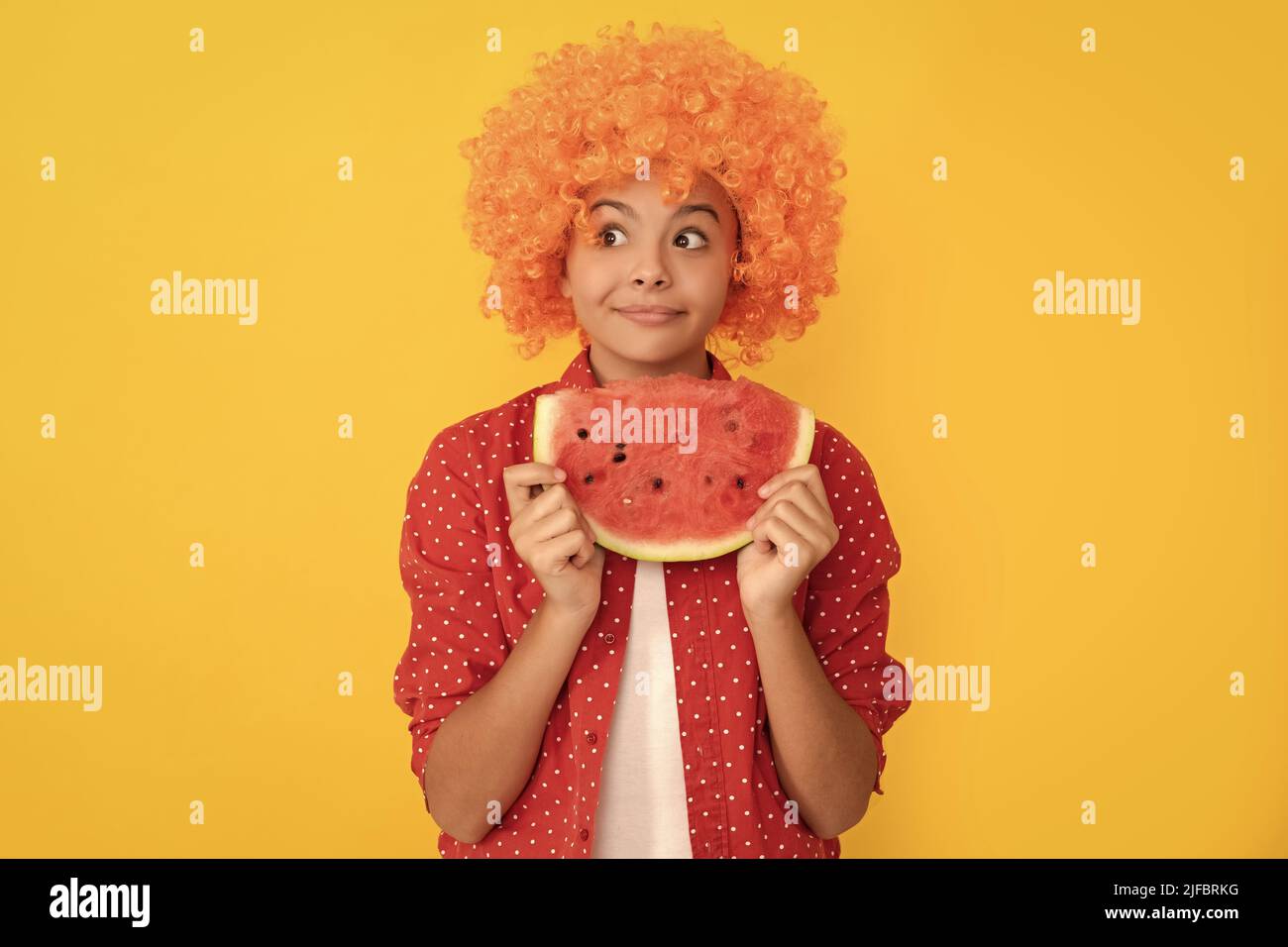 fancy teen girl having fun. summertime. face of child with orange hair
