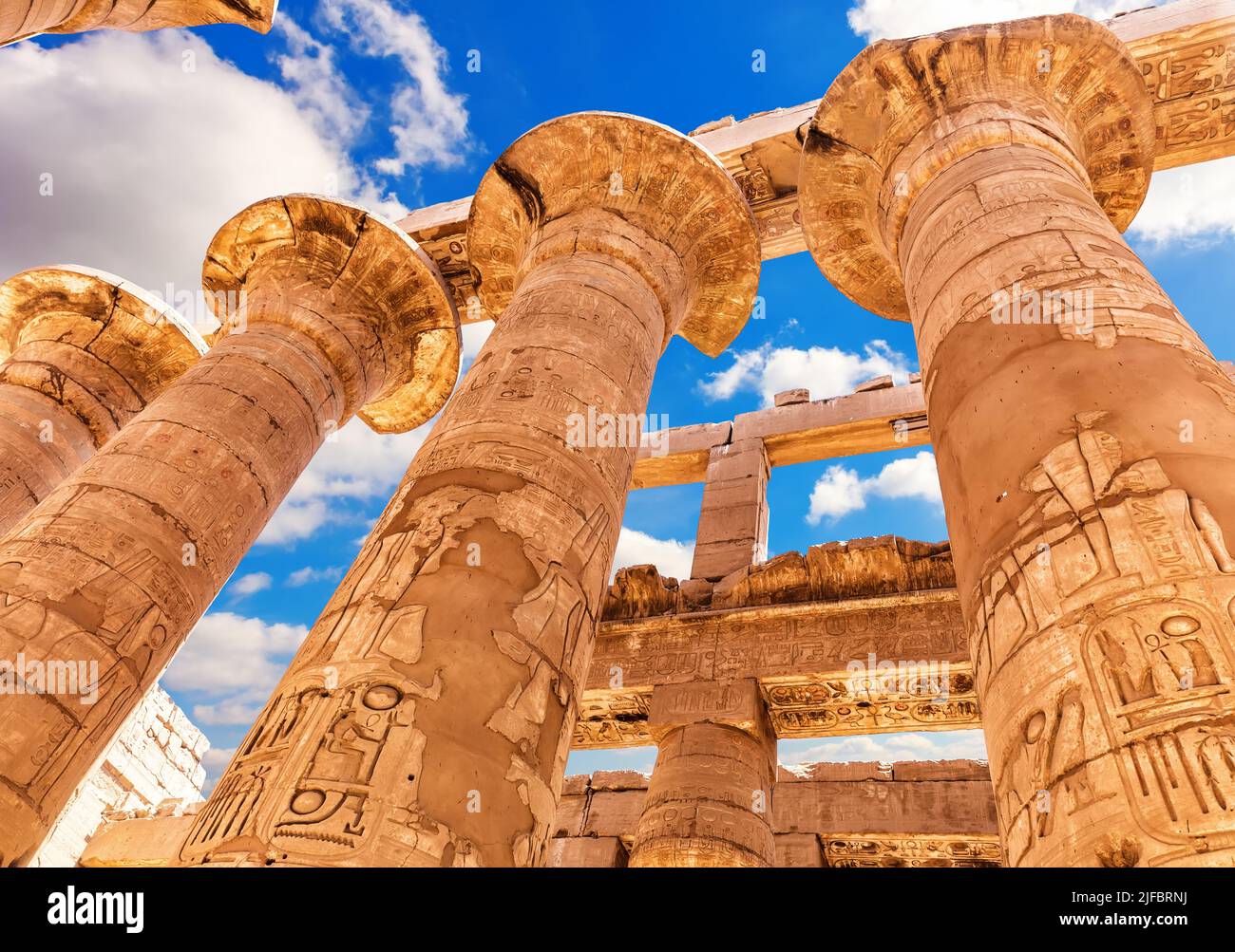 Ancient Columns with beautiful carvings, Karnak Temple, the Great Hypostyle Hall, Luxor, Egypt