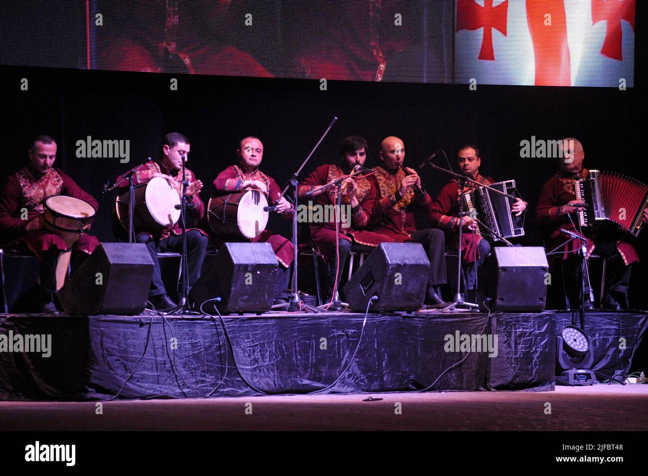 musicians dressed in national costumes playing folk musical