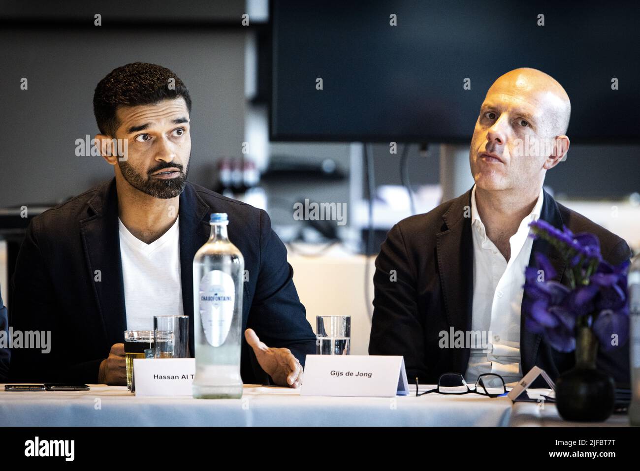 AMSTERDAM - Hassan Al Thawadi, secretary-general of the organizing committee of the World Cup in Qatar, and Gijs de Jong (r) of the KNVB during a meeting in the Johan Cruijff Arena. ANP RAMON VAN FLYMEN Stock Photo