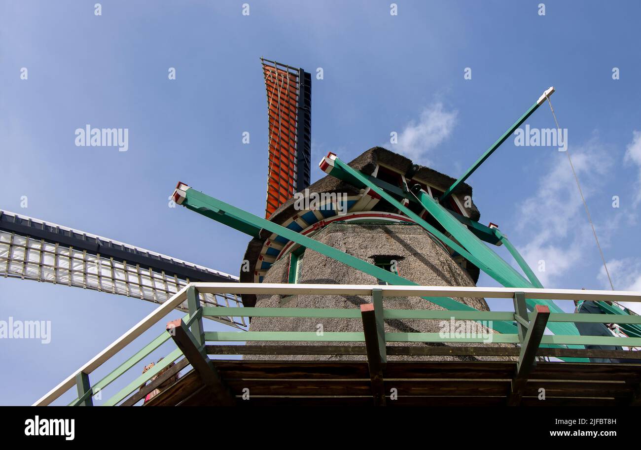 Old windmill in Zaan Schans countryside close to Amsterdam Stock Photo