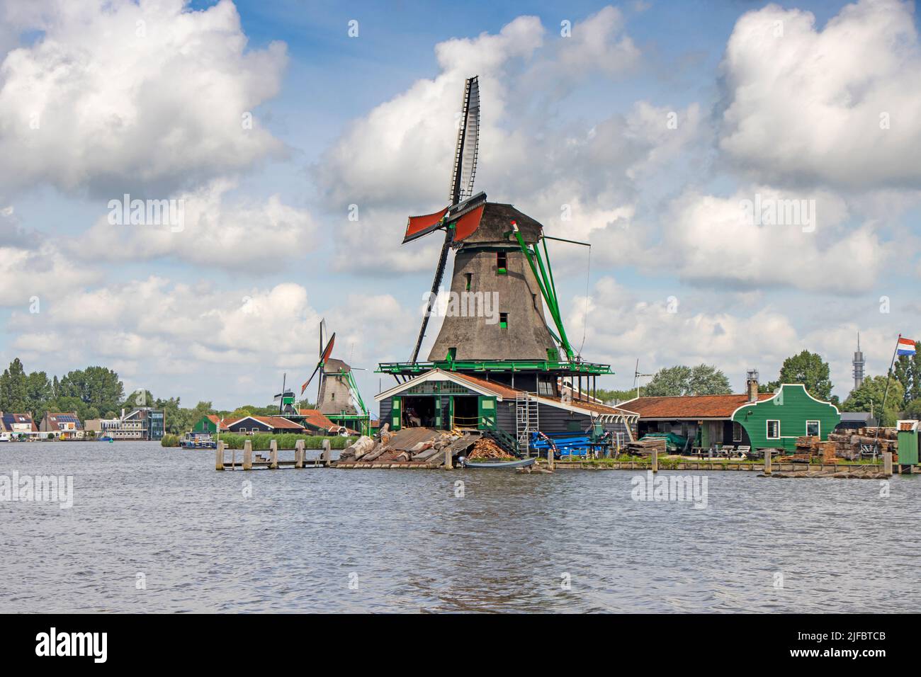Old windmill in Zaan Schans countryside close to Amsterdam Stock Photo